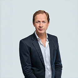 baby boy holding his baby sister